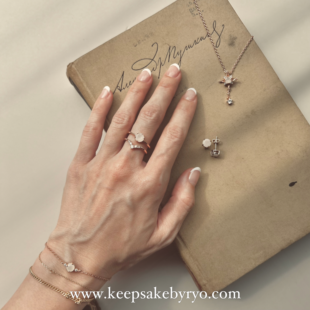 SOLITAIRE: SNOWDROP NECKLACE WITH ROUND INCLUSION STONE