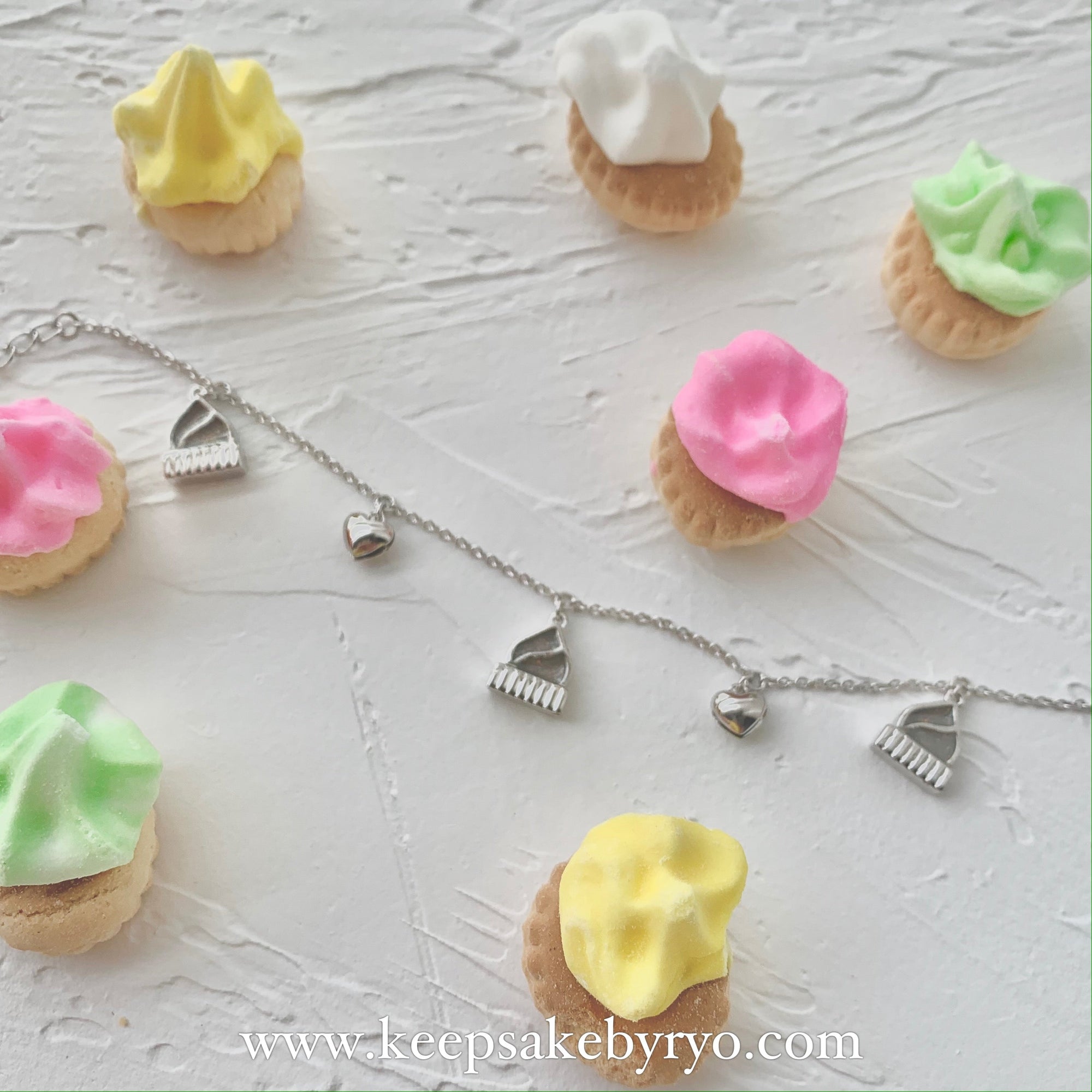 ASHES ICED GEM BISCUITS WITH HEART SHAPED BELLS BRACELET