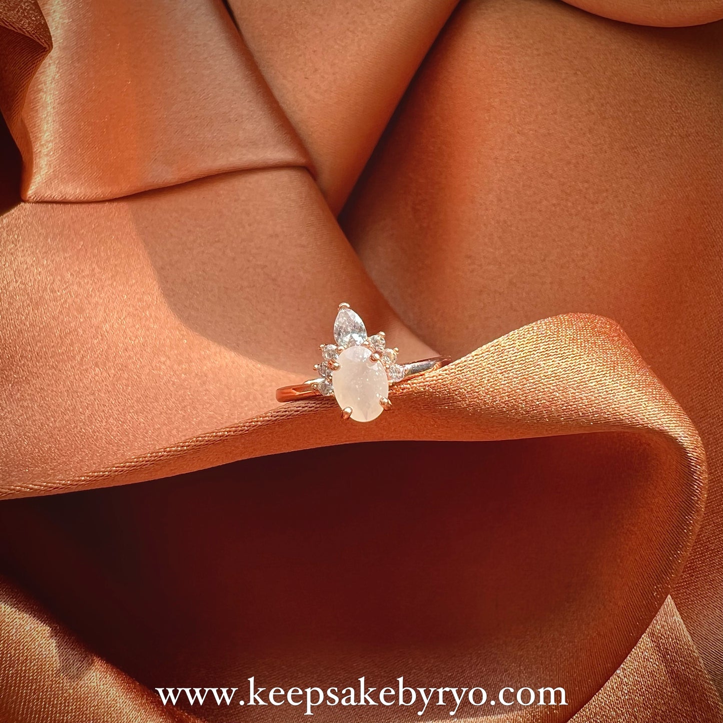 SOLITAIRE: ZIRA RING WITH OVAL SHAPED INCLUSION STONE