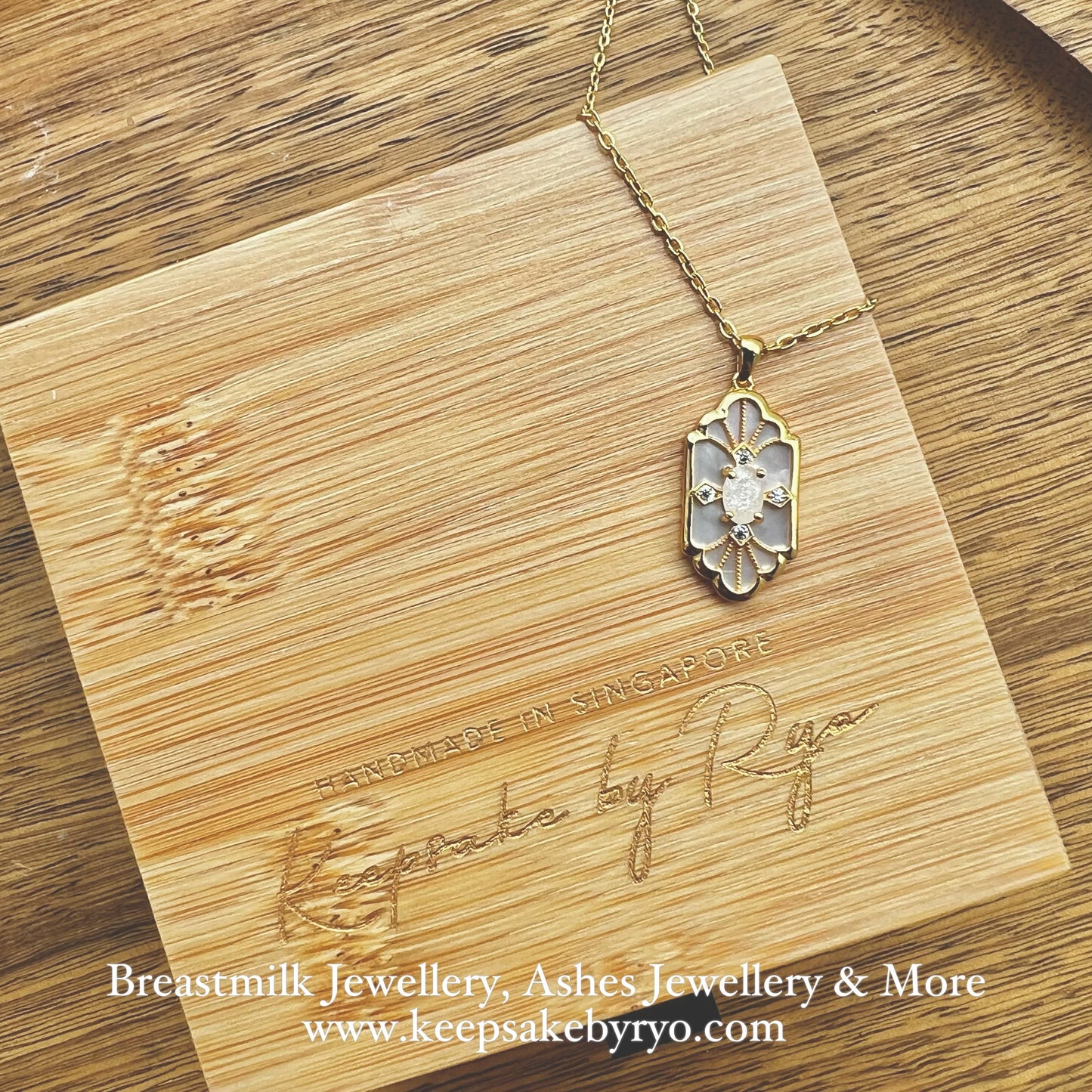 SOLITAIRE: MARIE MOTHER OF PEARL PENDANT WITH OVAL SHAPED SOLITAIRE