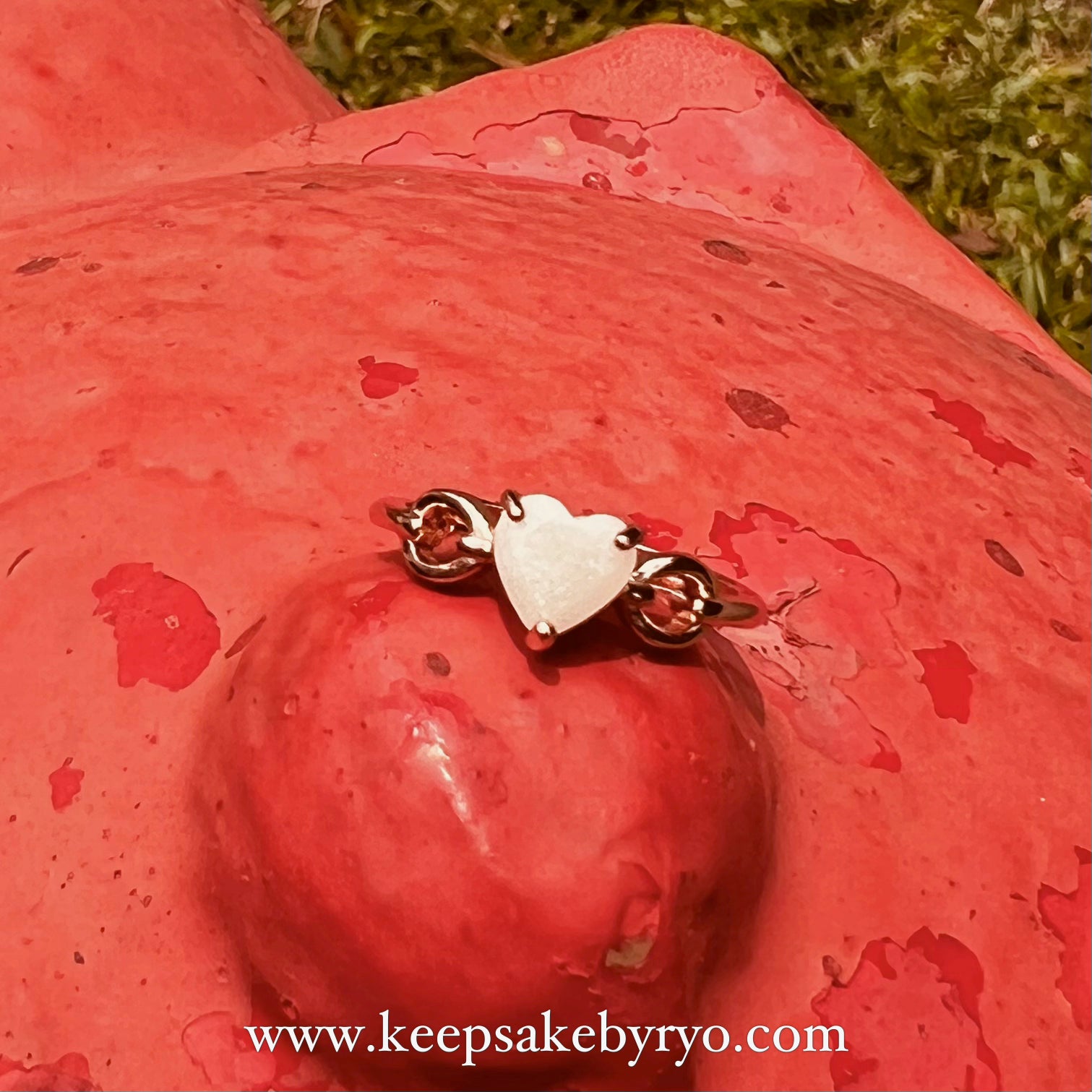 SOLITAIRE: HOPE HEARTLINKS RING WITH HEART SHAPED INCLUSION STONE