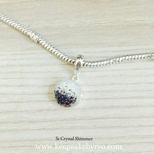 DANGLING CHARM WITH BREASTMILK AND CORD DUST