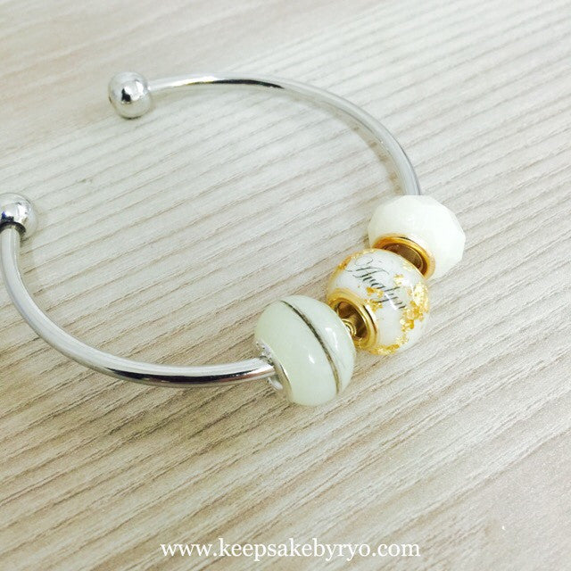 BREASTMILK EUROPEAN CHARM WITH PRECIOUS METAL FLAKES