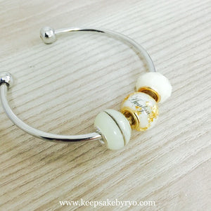 BREASTMILK EUROPEAN CHARM WITH PRECIOUS METAL FLAKES