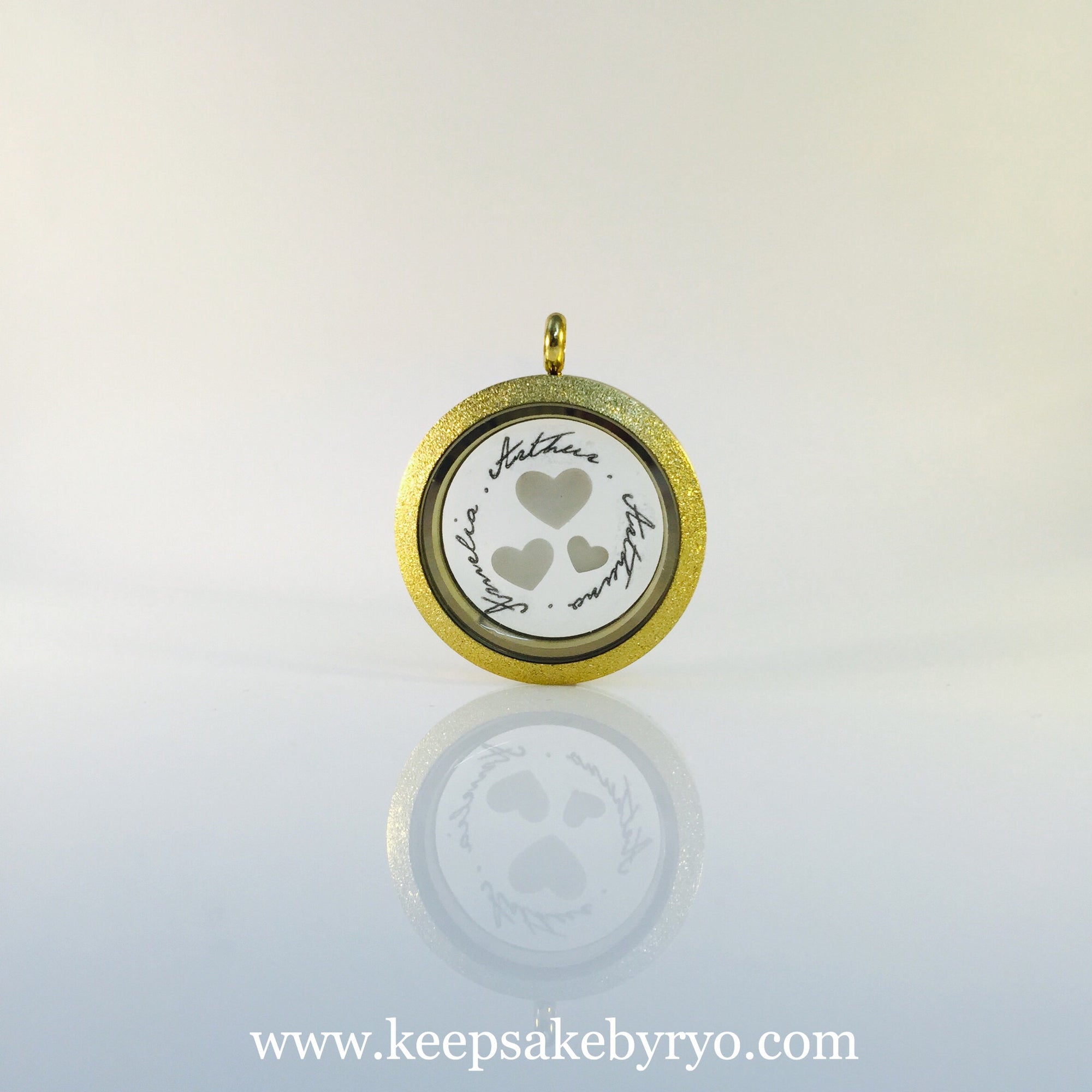 FAMILY OF HEARTS GLASS LOCKET