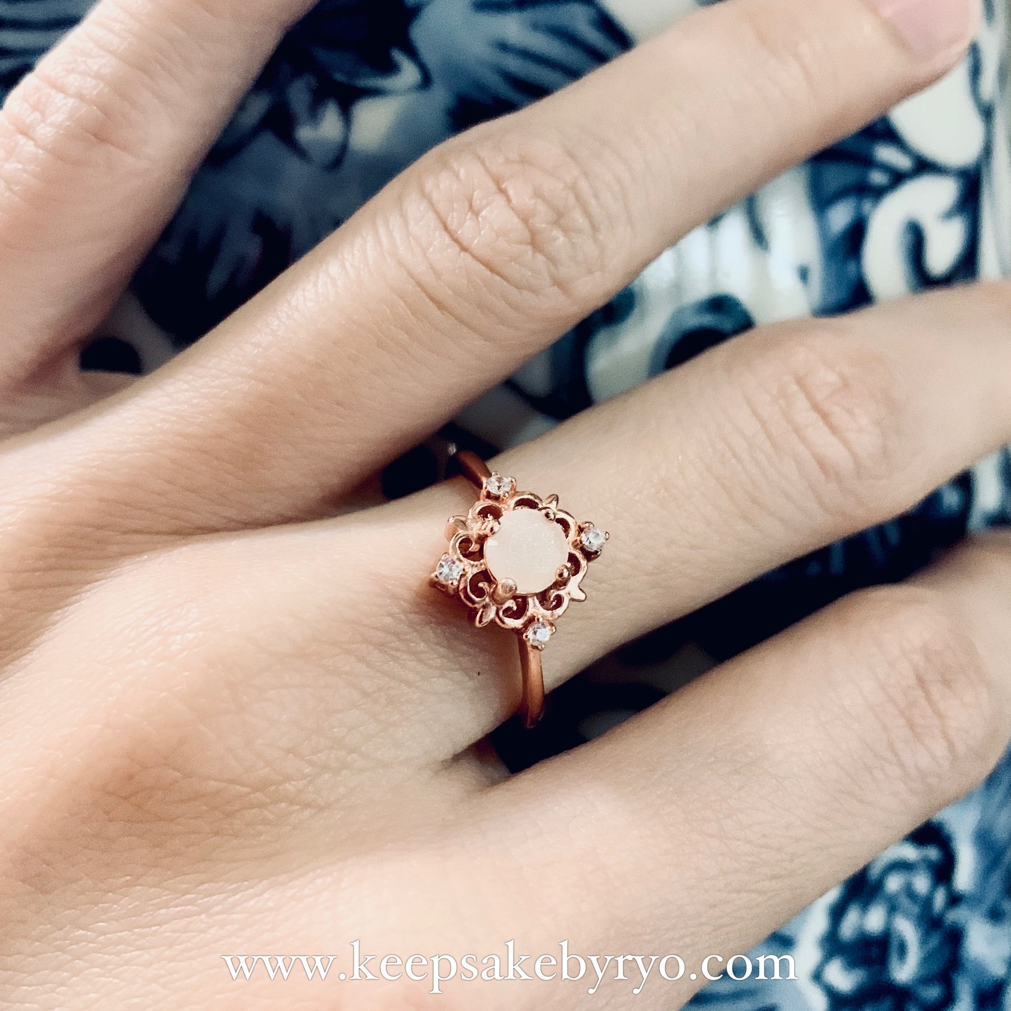 SOLITAIRE: LARA RING WITH ROUND INCLUSION STONE
