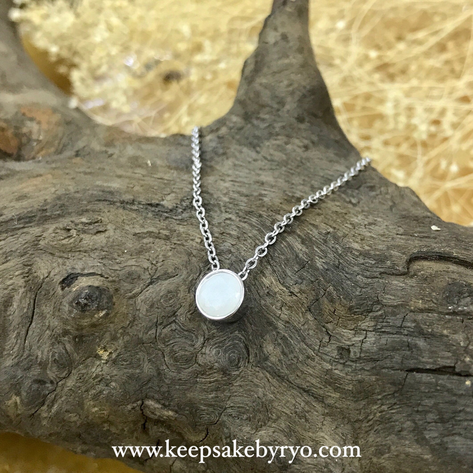 SOLITAIRE: BEZEL PENDANT NECKLACE WITH ROUND INCLUSION STONE