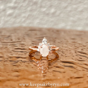 SOLITAIRE: ZIRA RING WITH OVAL SHAPED INCLUSION STONE