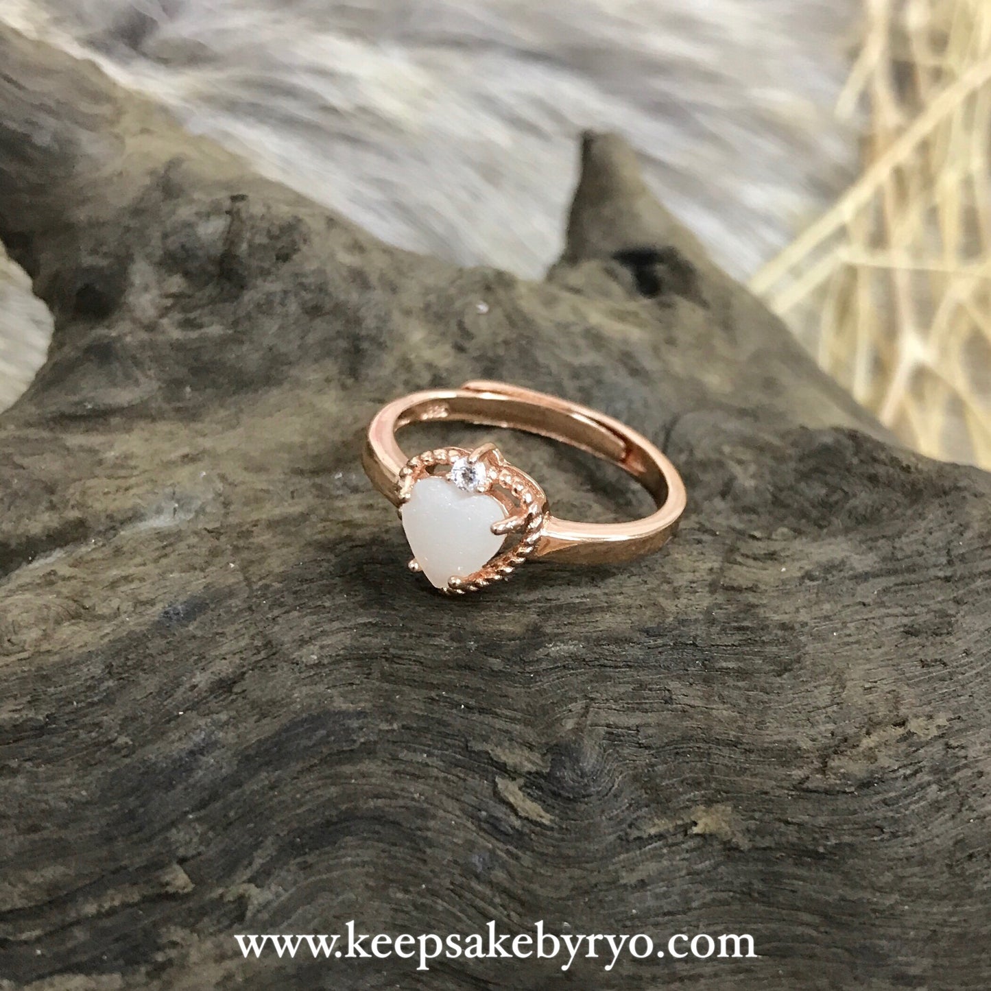 SOLITAIRE: CHIARA RING WITH HEART SHAPED INCLUSION STONE