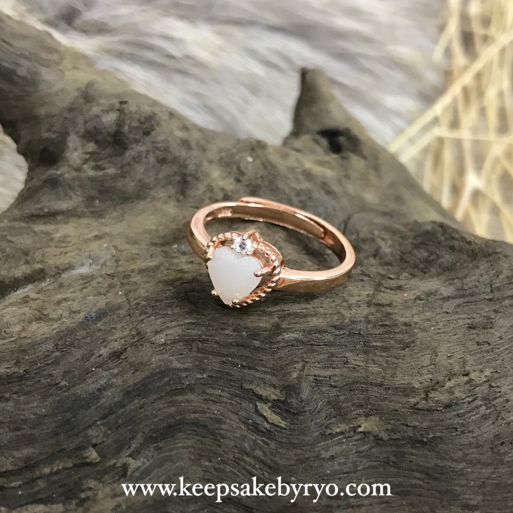 SOLITAIRE: CHIARA RING WITH HEART SHAPED INCLUSION STONE
