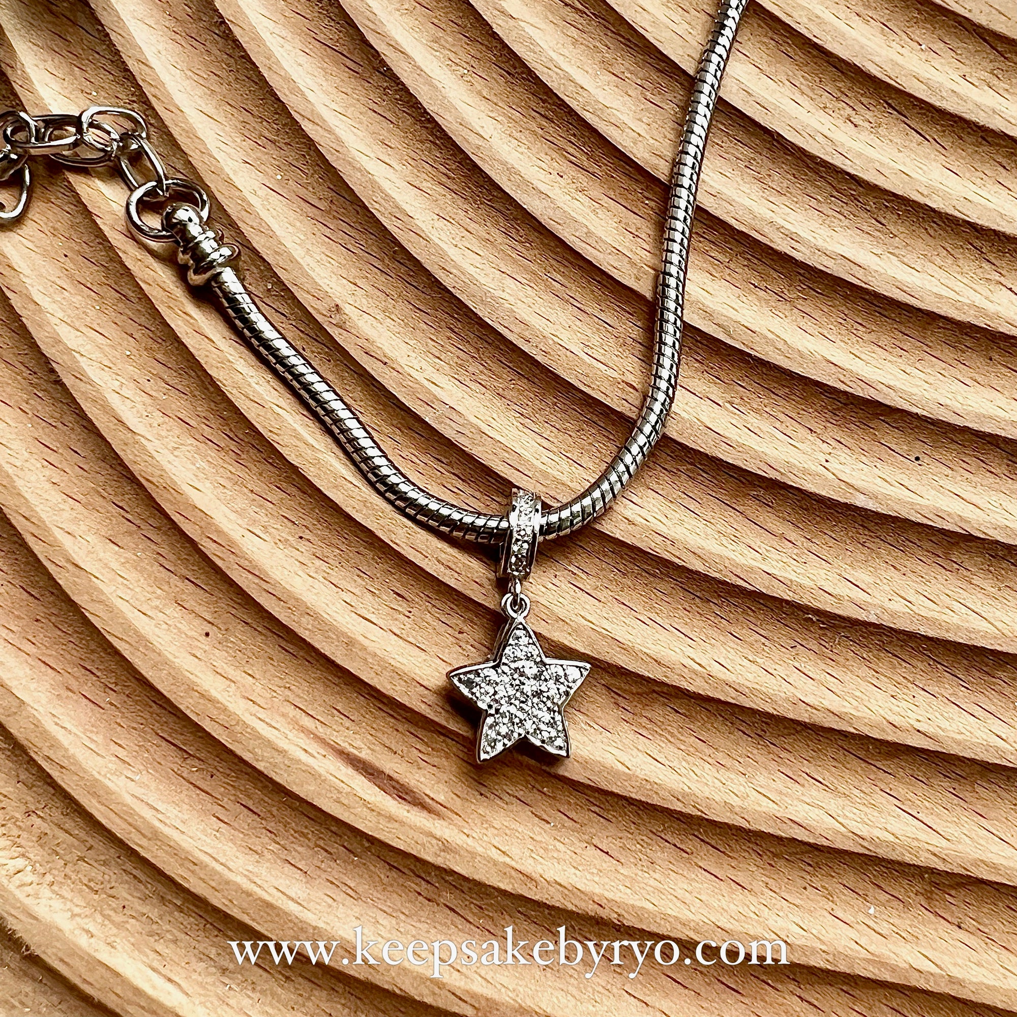 ASHES DANGLING STAR CHARM