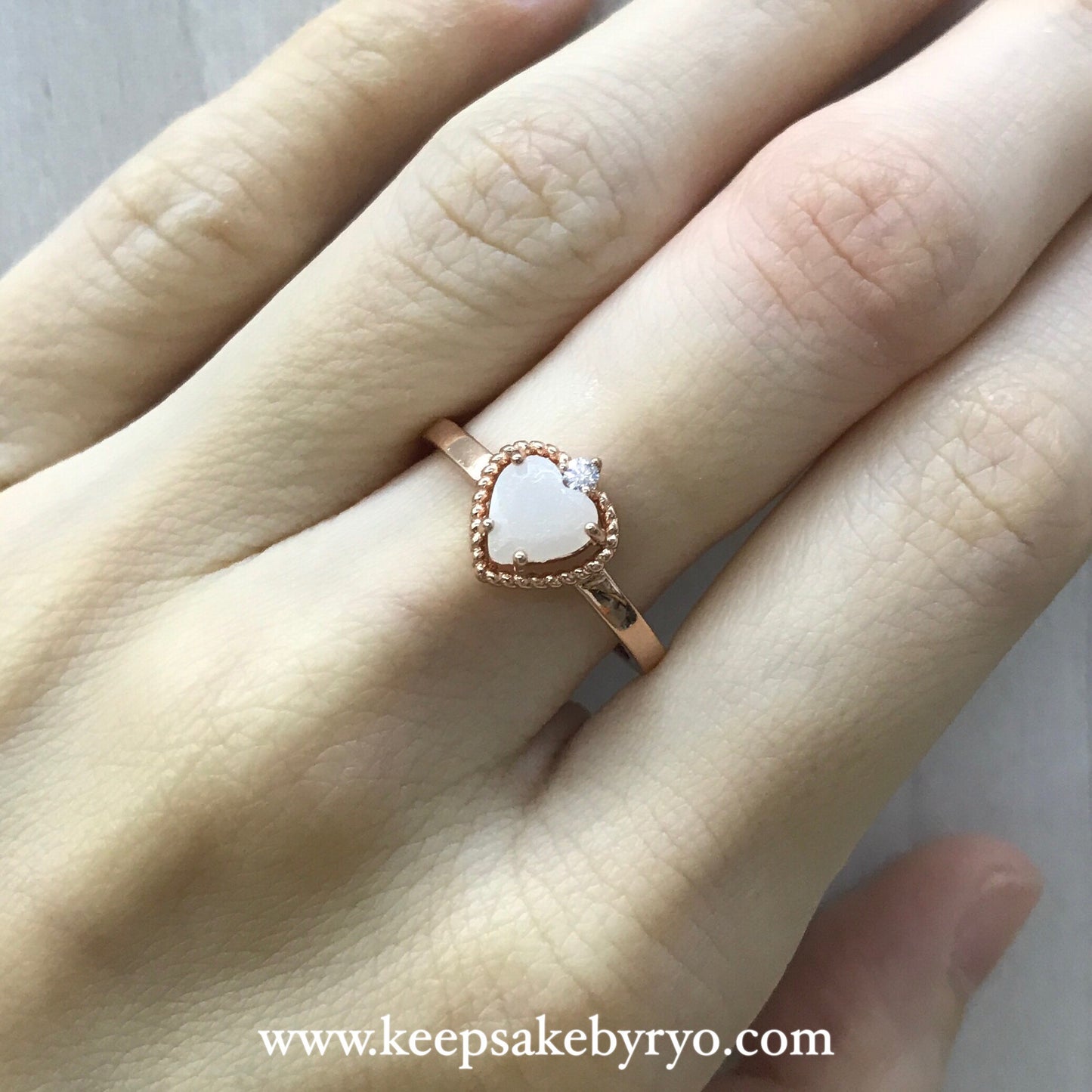 SOLITAIRE: CHIARA RING WITH HEART SHAPED INCLUSION STONE