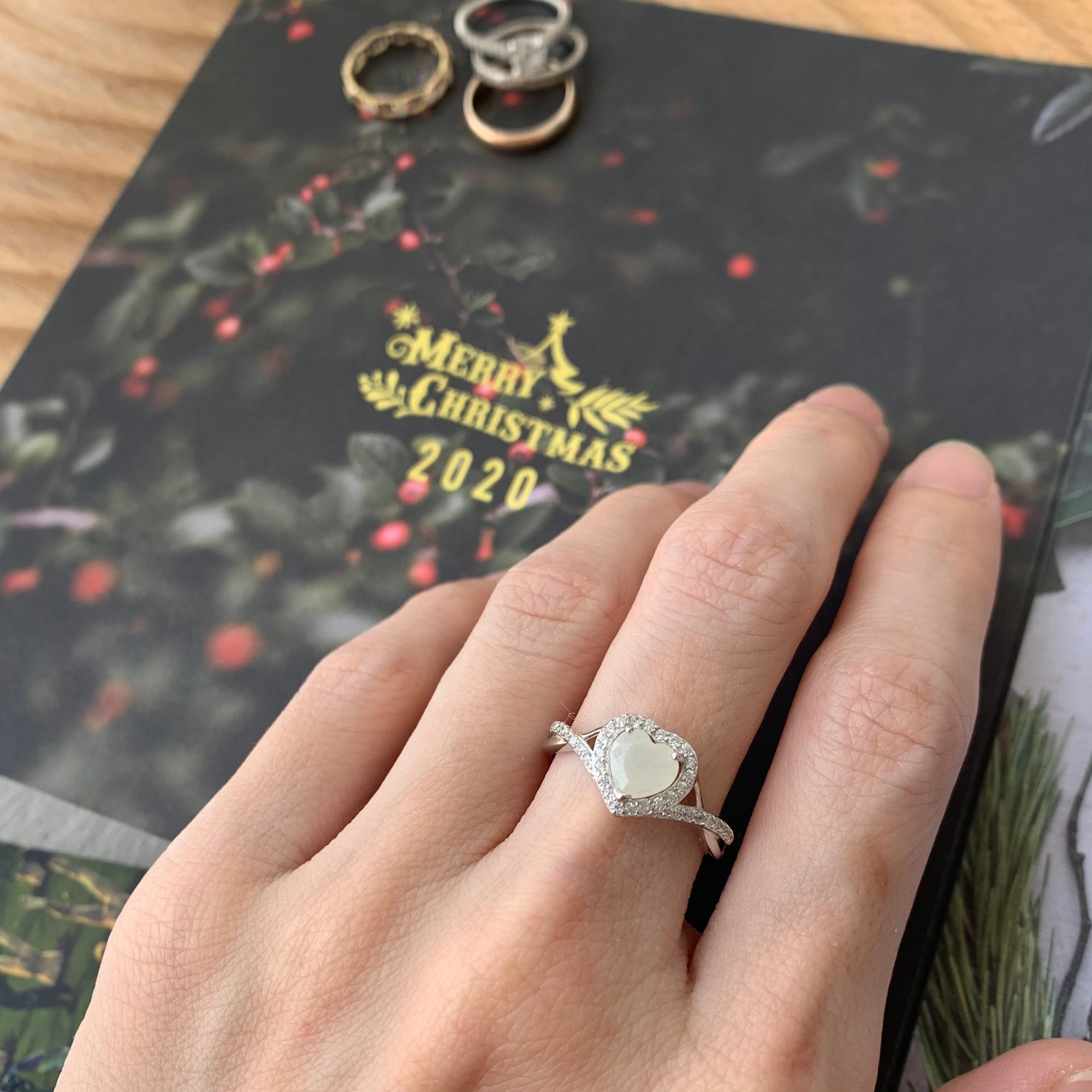 SOLITAIRE: NOELLE RING WITH HEART SHAPED INCLUSION STONE