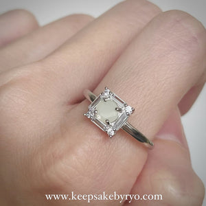 SOLITAIRE: THEA RING WITH ROUND SHAPED INCLUSION STONE