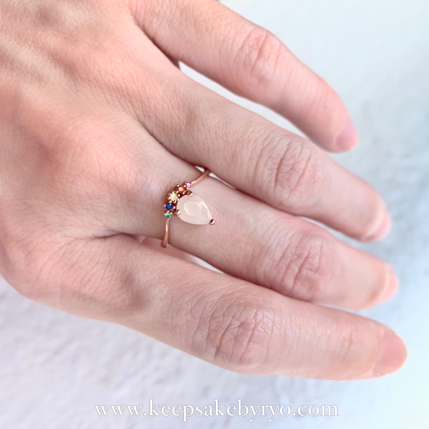 SOLITAIRE: COVA RAINBOW DROP WITH TEARDROP INCLUSION RING