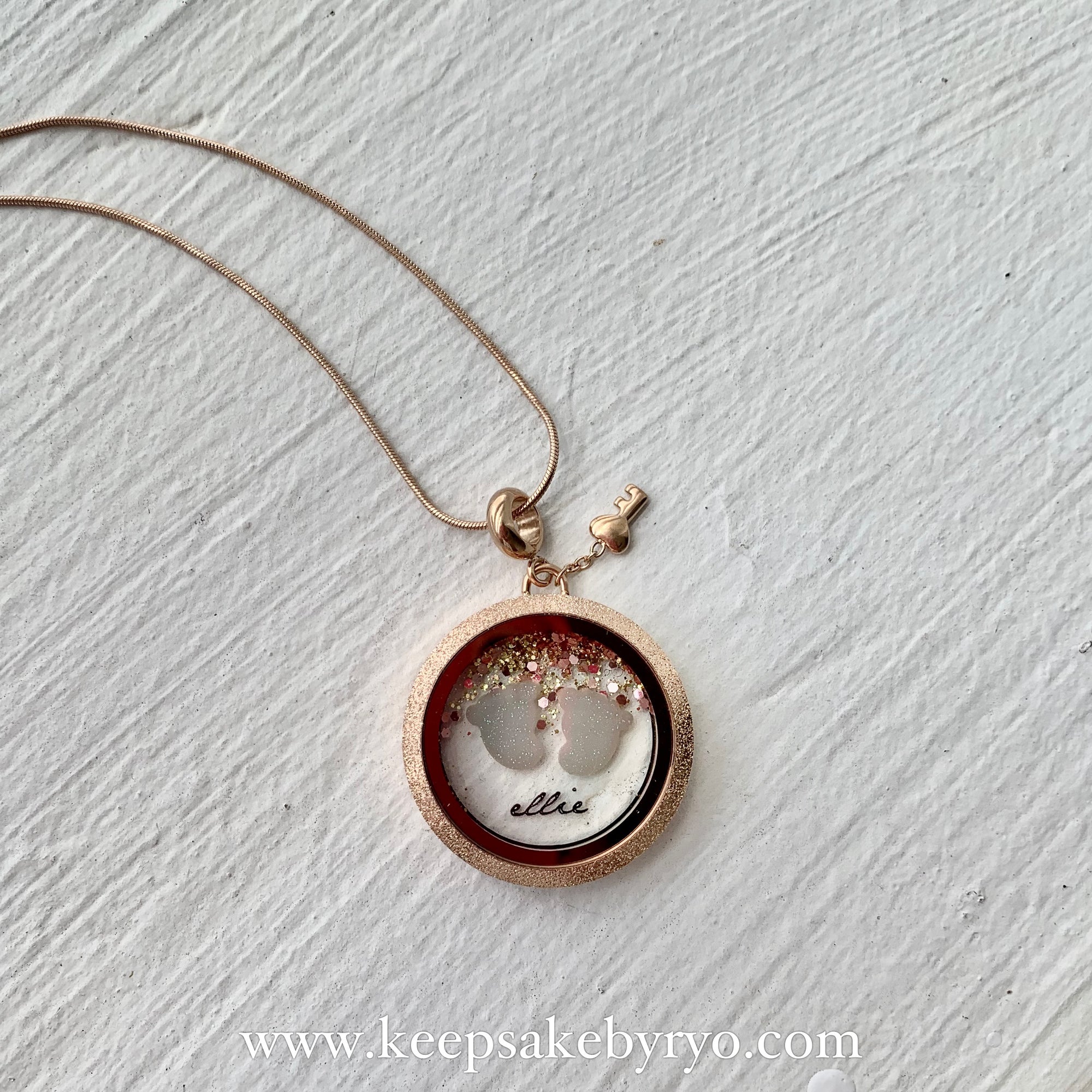 BABY FEET AND NAME GLASS LOCKET