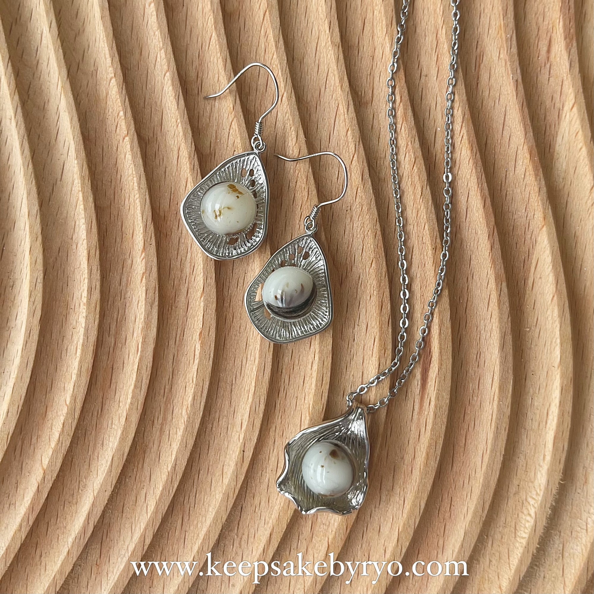 GLOBES: Azure Seashell Pendant