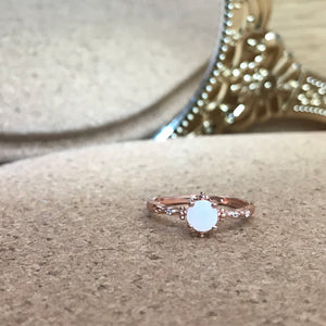 SOLITAIRE: ARIEL RING WITH ROUND INCLUSION STONE