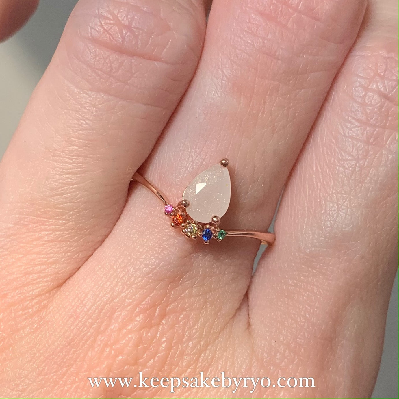 SOLITAIRE: COVA RAINBOW DROP WITH TEARDROP INCLUSION RING