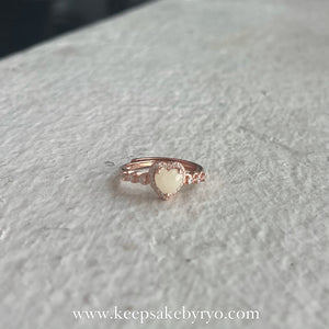 SOLITAIRE: VALEN RING WITH HEART SHAPED INCLUSION STONE