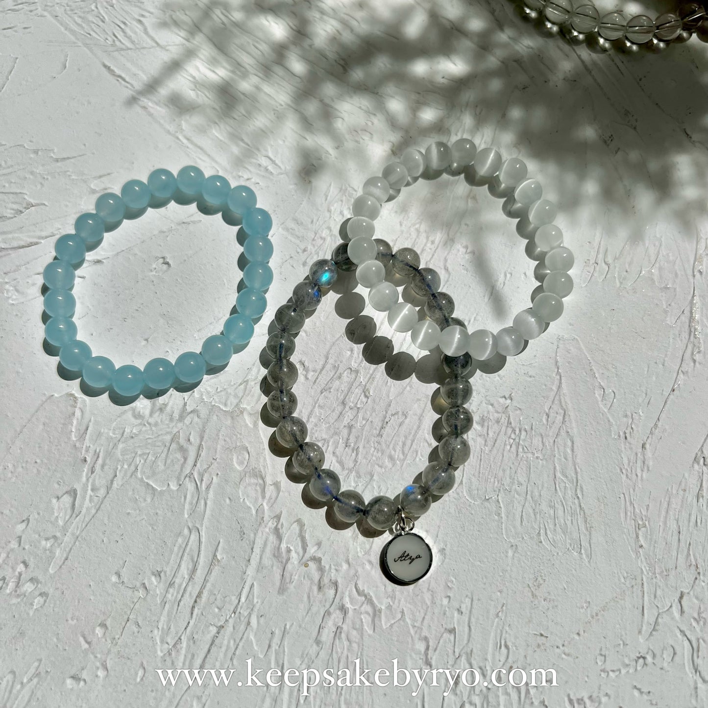 CRYSTAL BRACELET: 12MM ROUND INCLUSION PENDANT