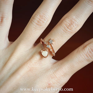 SOLITAIRE: CELESTE RING WITH HEART INCLUSION SOLITAIRE