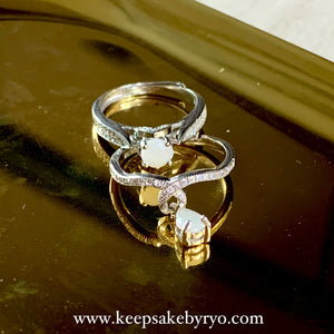 SOLITAIRE:  INAZ RING WITH ROUND INCLUSION STONE