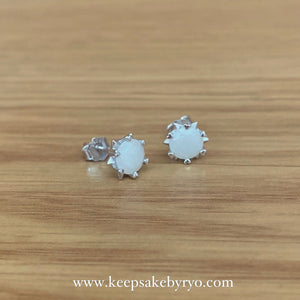 SOLITAIRE: STARBURST HEARTS EAR STUDS WITH ROUND INCLUSION STONE